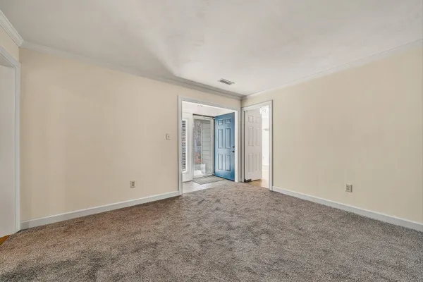 an empty room with an entryway