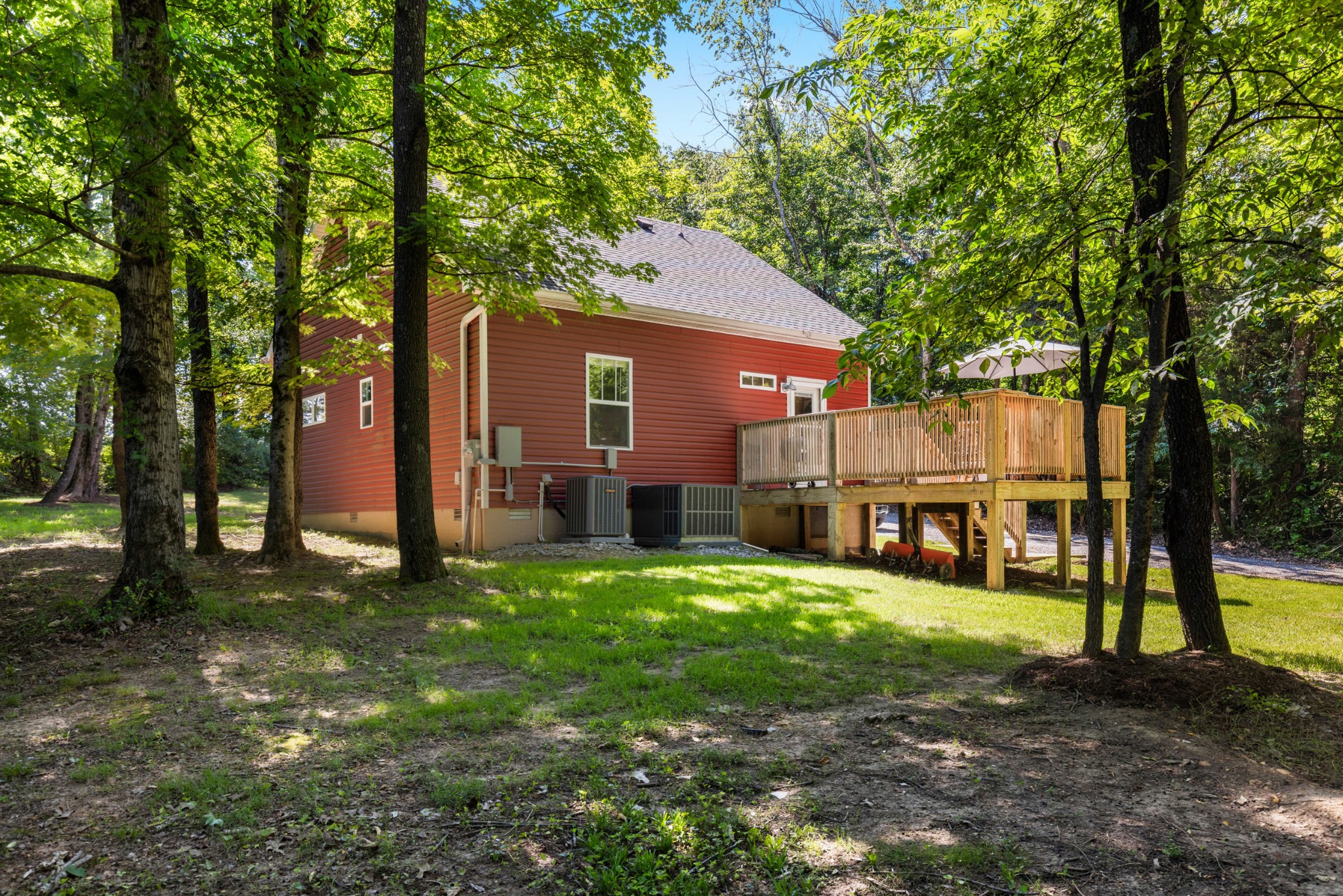 115 North Adams Street Adams, TN 37010 - Photo 40 of 44 a view of a house with a yard
