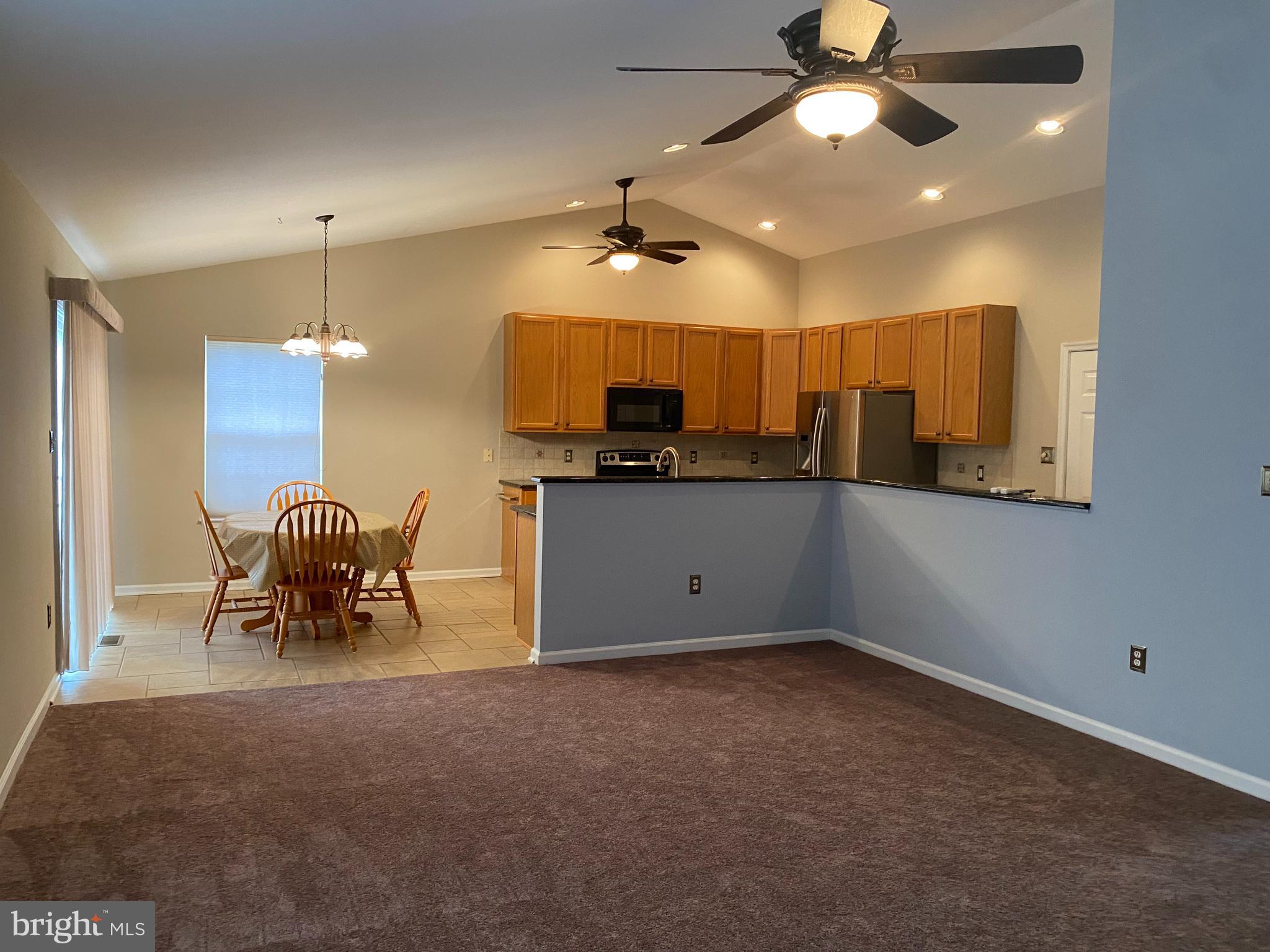 14 Mailly Drive Townsend, DE 19734 - Photo 4 of 22 a kitchen with granite countertop a stove and a sink with granite countertops