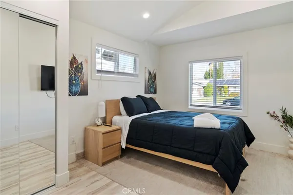 a bathroom with a toilet sink and shower