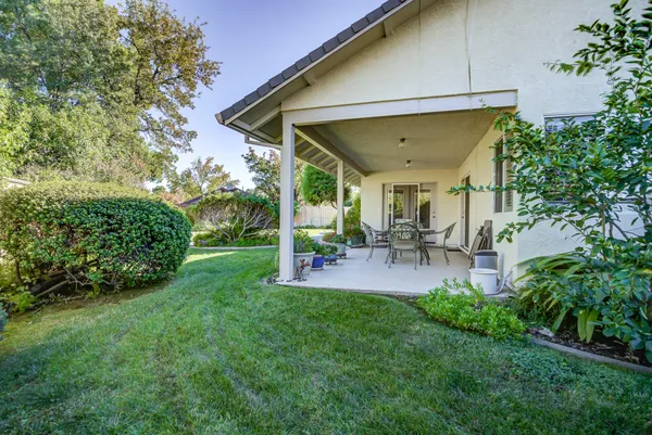 a garden view with a seating space