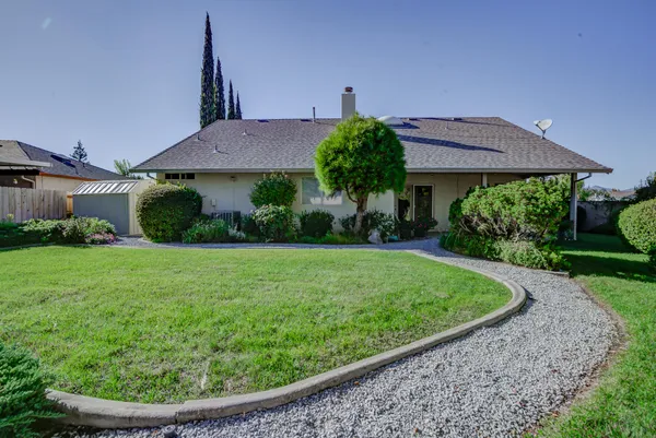 a view of a house with a garden