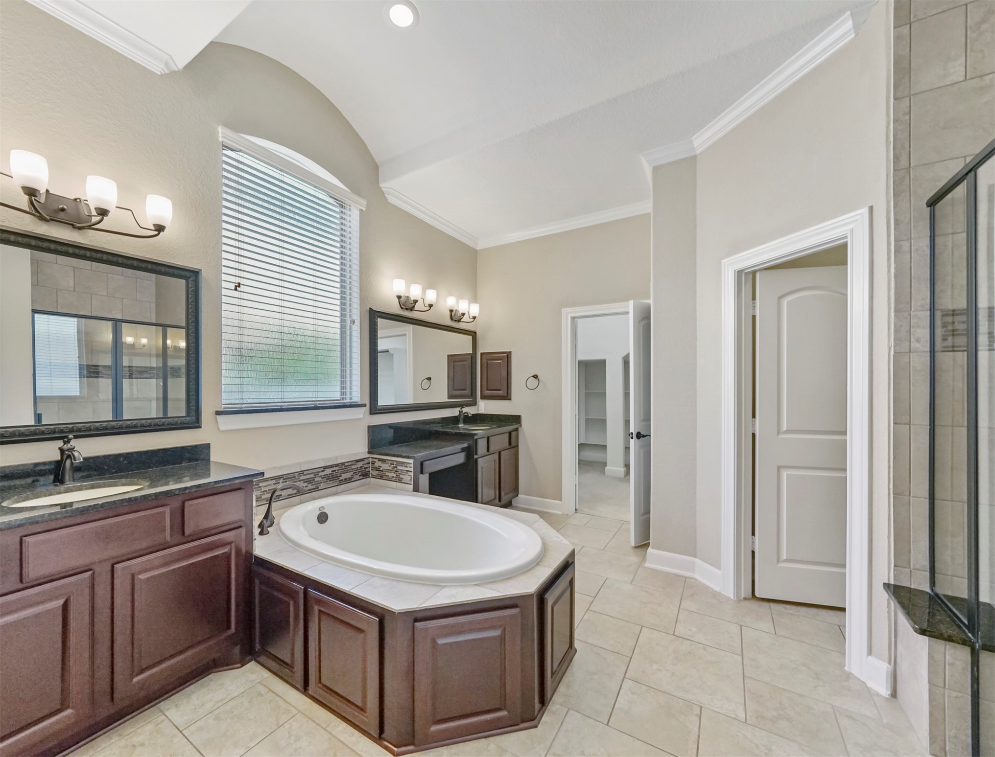 9915 Rochs Hill Court Katy, TX 77494 - Photo 12 of 32 a kitchen with a sink stove and refrigerator