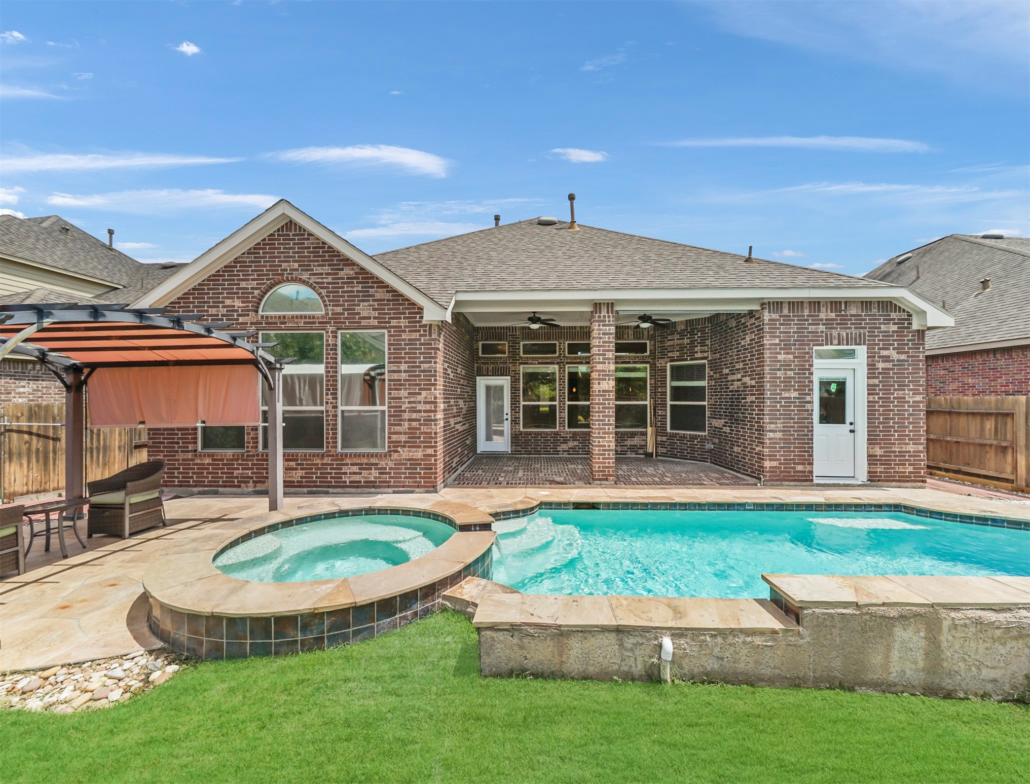 9915 Rochs Hill Court Katy, TX 77494 - Photo 2 of 32 front view of a house with a yard