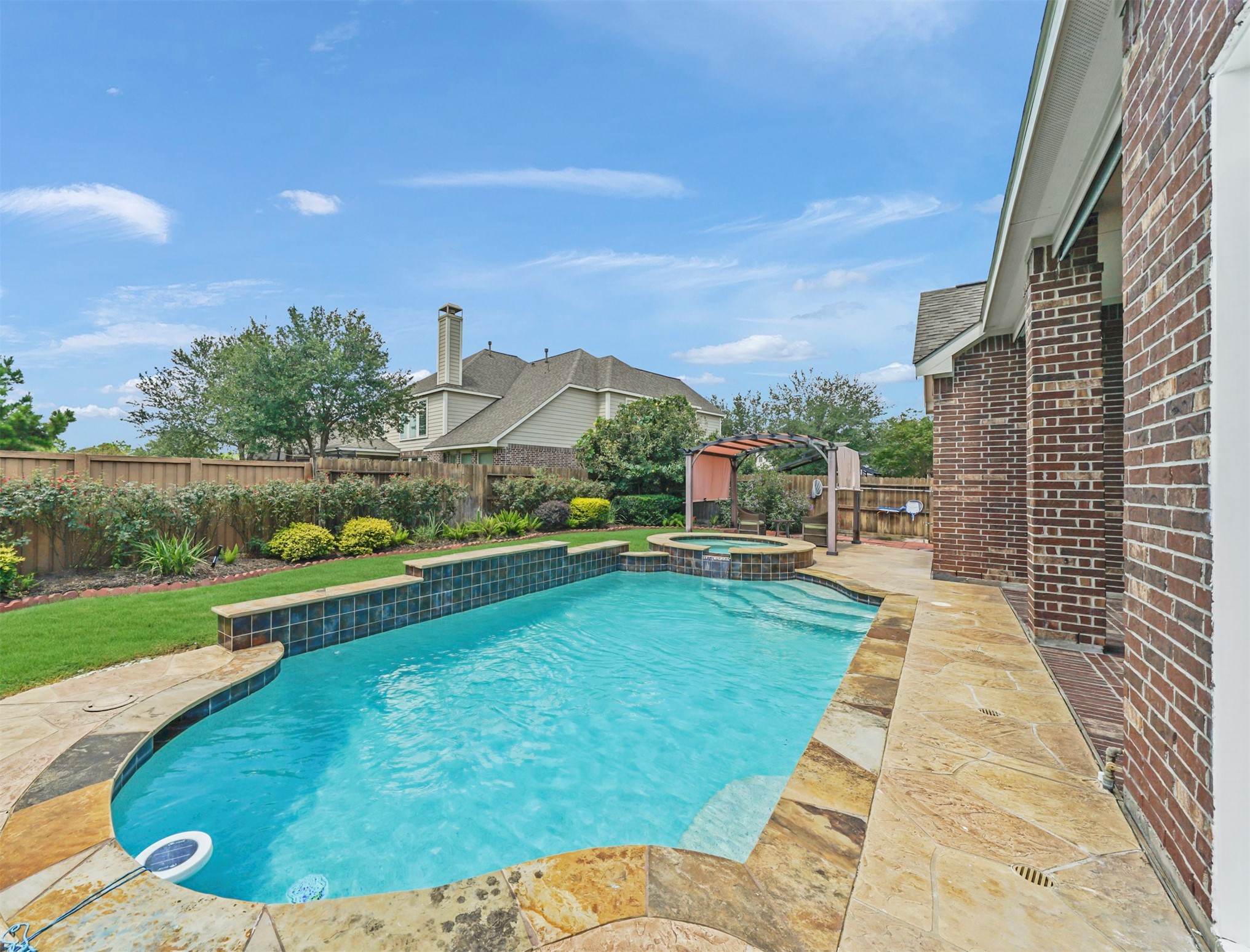 9915 Rochs Hill Court Katy, TX 77494 - Photo 26 of 32 a view of swimming pool from a balcony