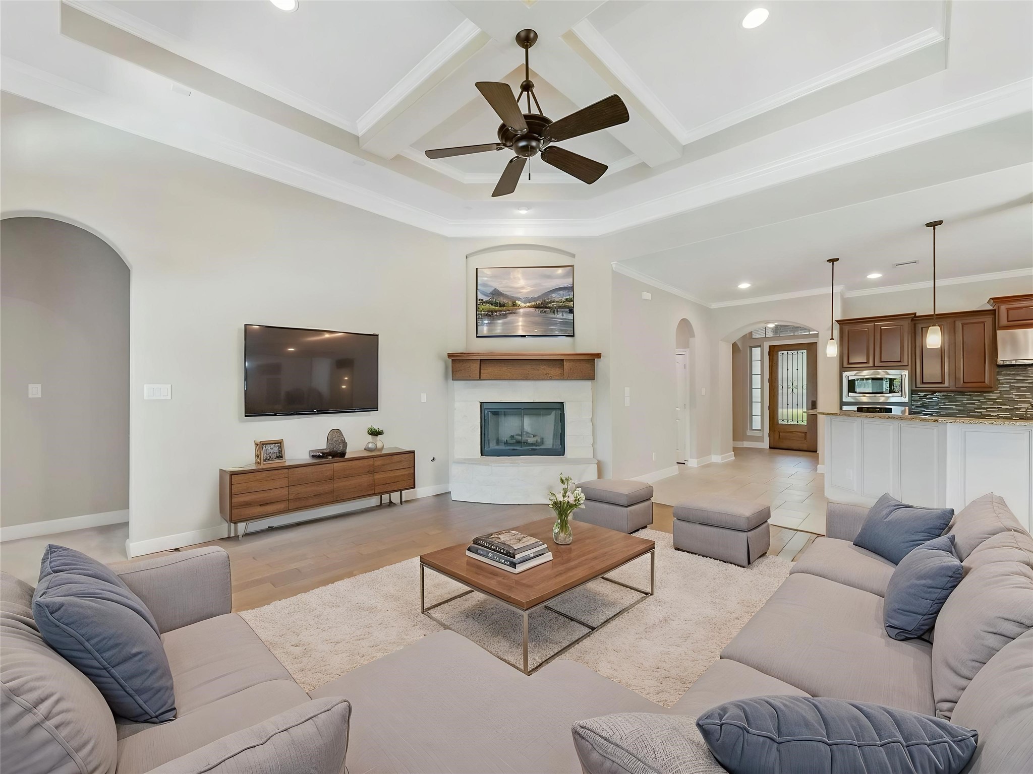 9915 Rochs Hill Court Katy, TX 77494 - Photo 6 of 32 a living room with furniture kitchen view and a flat screen tv