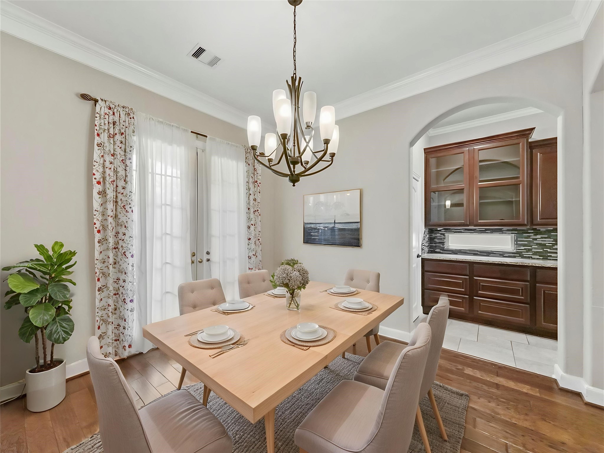 9915 Rochs Hill Court Katy, TX 77494 - Photo 7 of 32 a view of a dining room with furniture wooden floor and chandelier