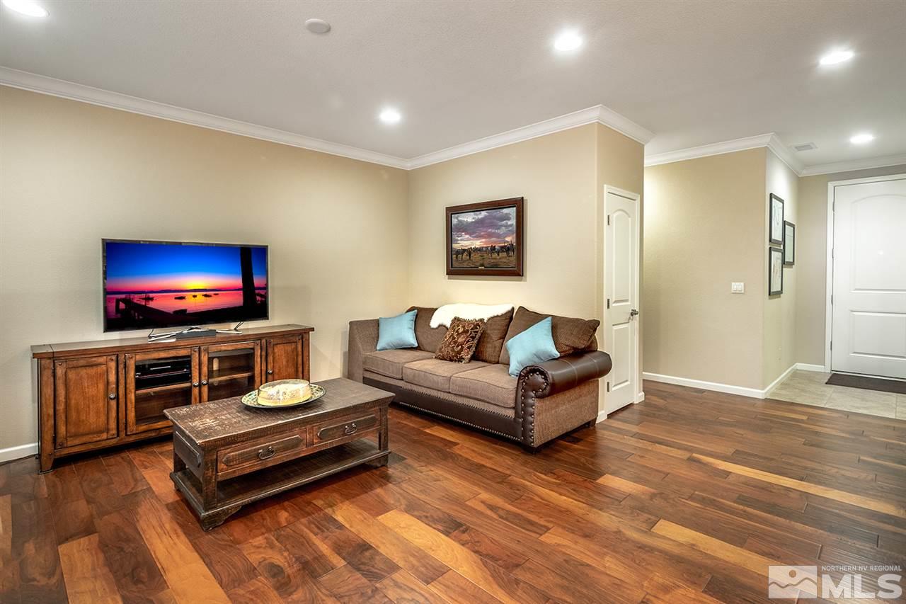 2260 Makenna Drive Reno, NV 89521 - Photo 5 of 27 a living room with furniture and a flat screen tv