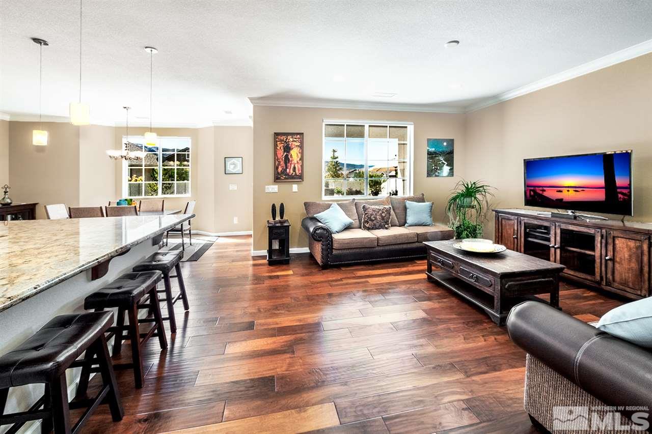 2260 Makenna Drive Reno, NV 89521 - Photo 6 of 27 a living room with furniture flat screen tv and wooden floor