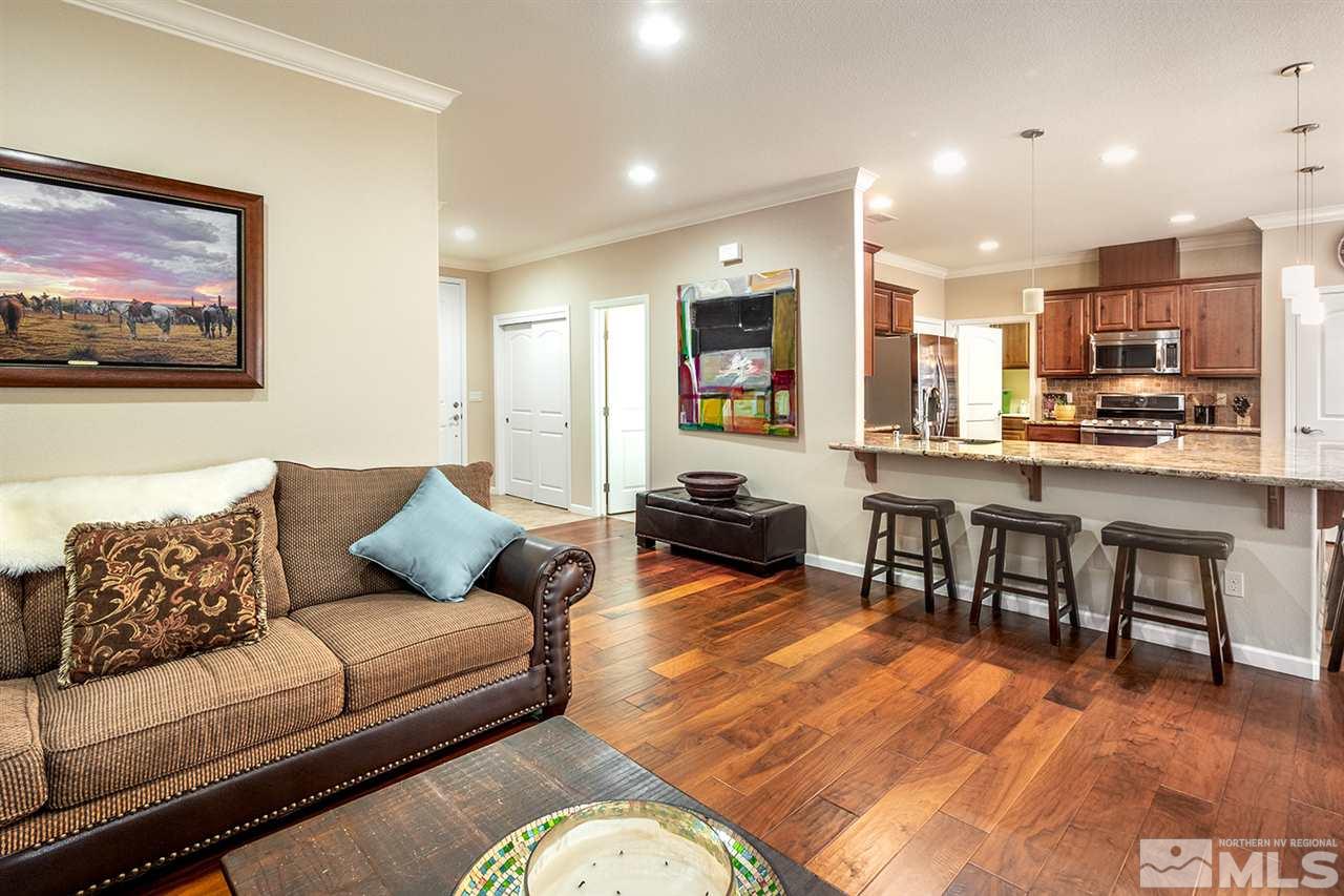 2260 Makenna Drive Reno, NV 89521 - Photo 7 of 27 a living room with furniture kitchen view and a wooden floor