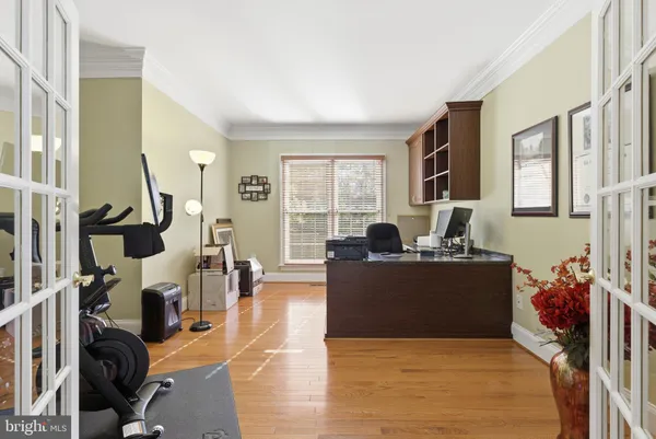 a living room with furniture windows and a fireplace