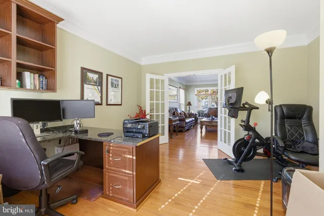 a view of a workspace with furniture and a livingroom