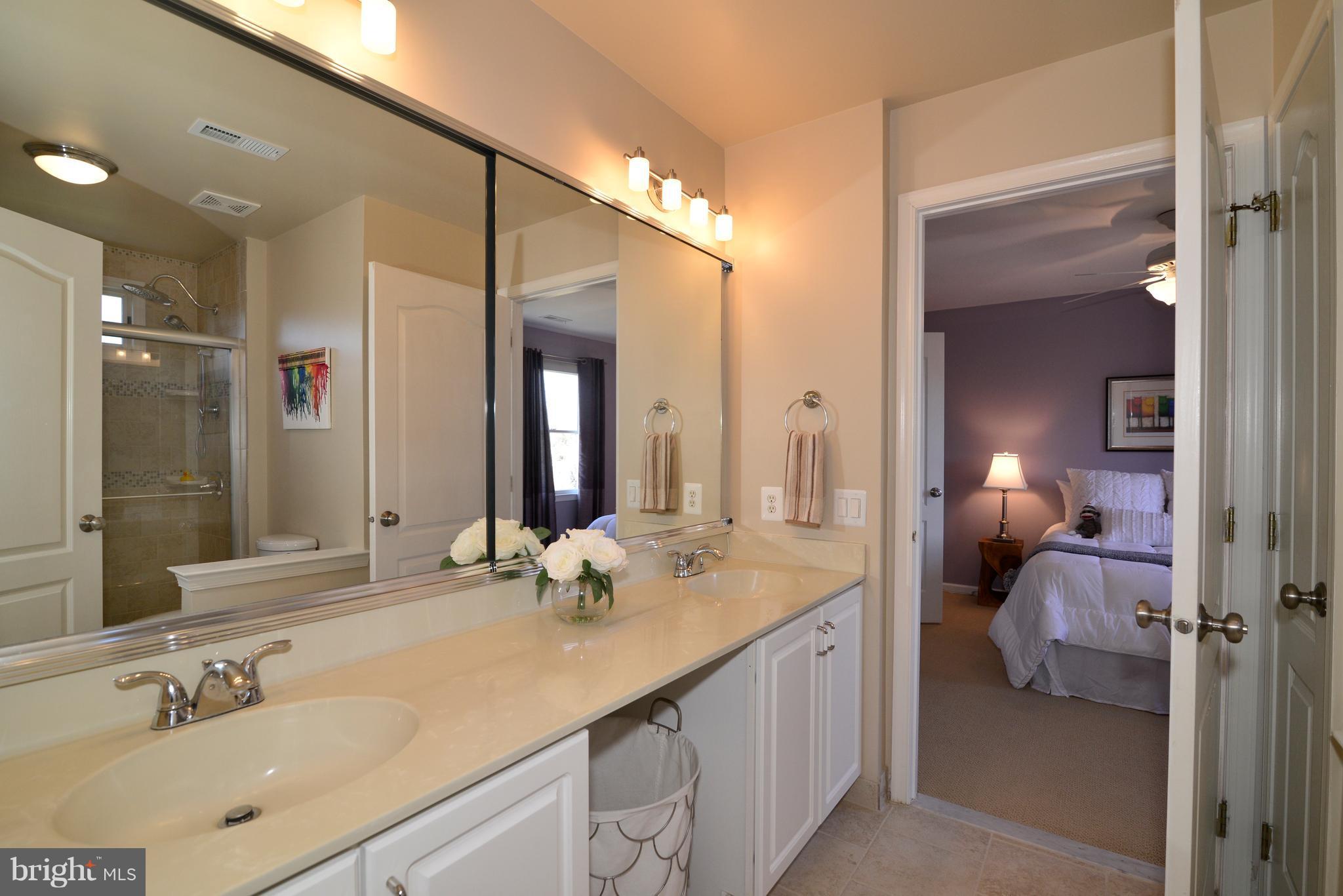 1343 Dasher Lane Reston, VA 20190 - Photo 20 of 30 The Buddy Bath has double sinks and ceramic tile.