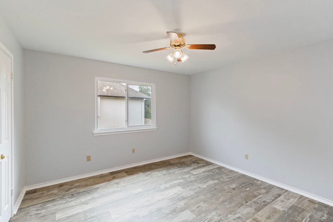 410 Steeplechase Drive Georgetown, TX 78626 - Photo 9 of 15 an empty room with a window