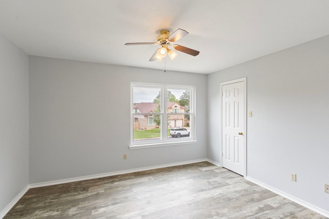 410 Steeplechase Drive Georgetown, TX 78626 - Photo 10 of 15 a view of an empty room with a window