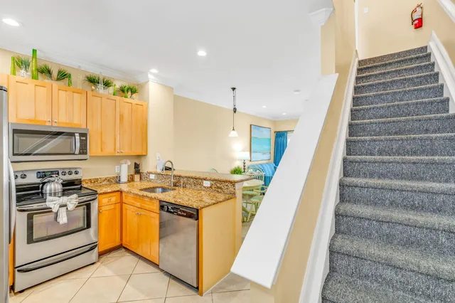 a bathroom with a bathtub and a sink