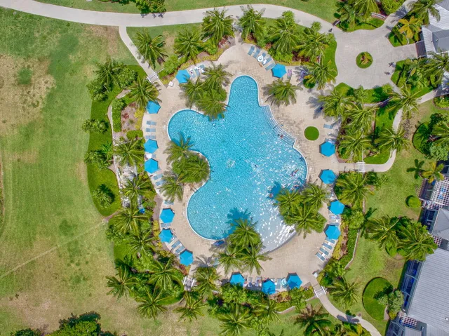 a living room with furniture window and wooden floor