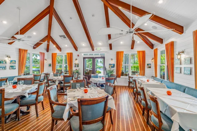 a view of a lake with houses in the back