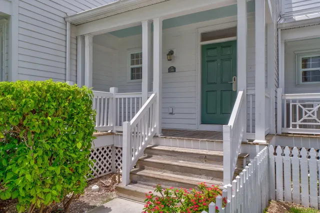 a view of balcony with furniture