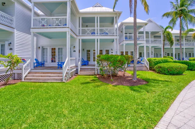 a view of a balcony with chairs