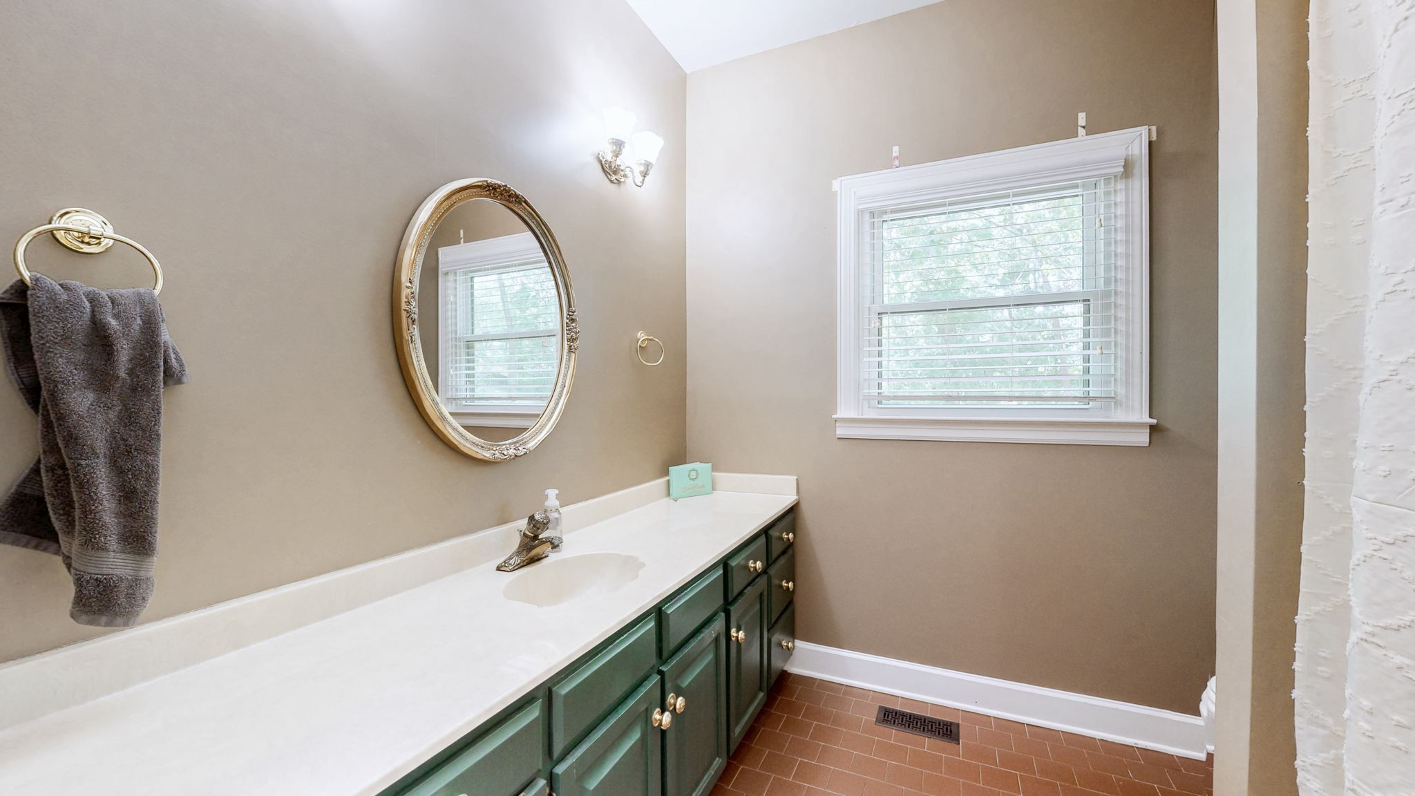 1928 Arlington Road Lebanon, TN 37087 - Photo 64 of 90 a bathroom with a sink and a mirror