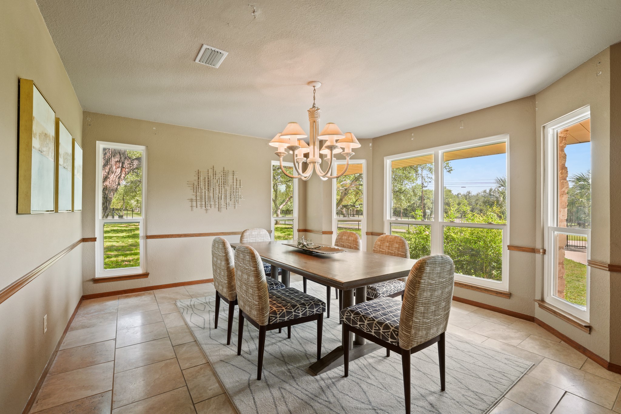 176 Logan Ranch Road Georgetown, TX 78628 - Photo 8 of 38 Dining room featuring a chandelier and light tile patterned floors