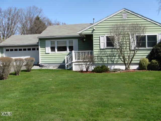 29 Barnum Road Danbury, CT 06811 - Photo 1 of 1 a front view of a house with a garden