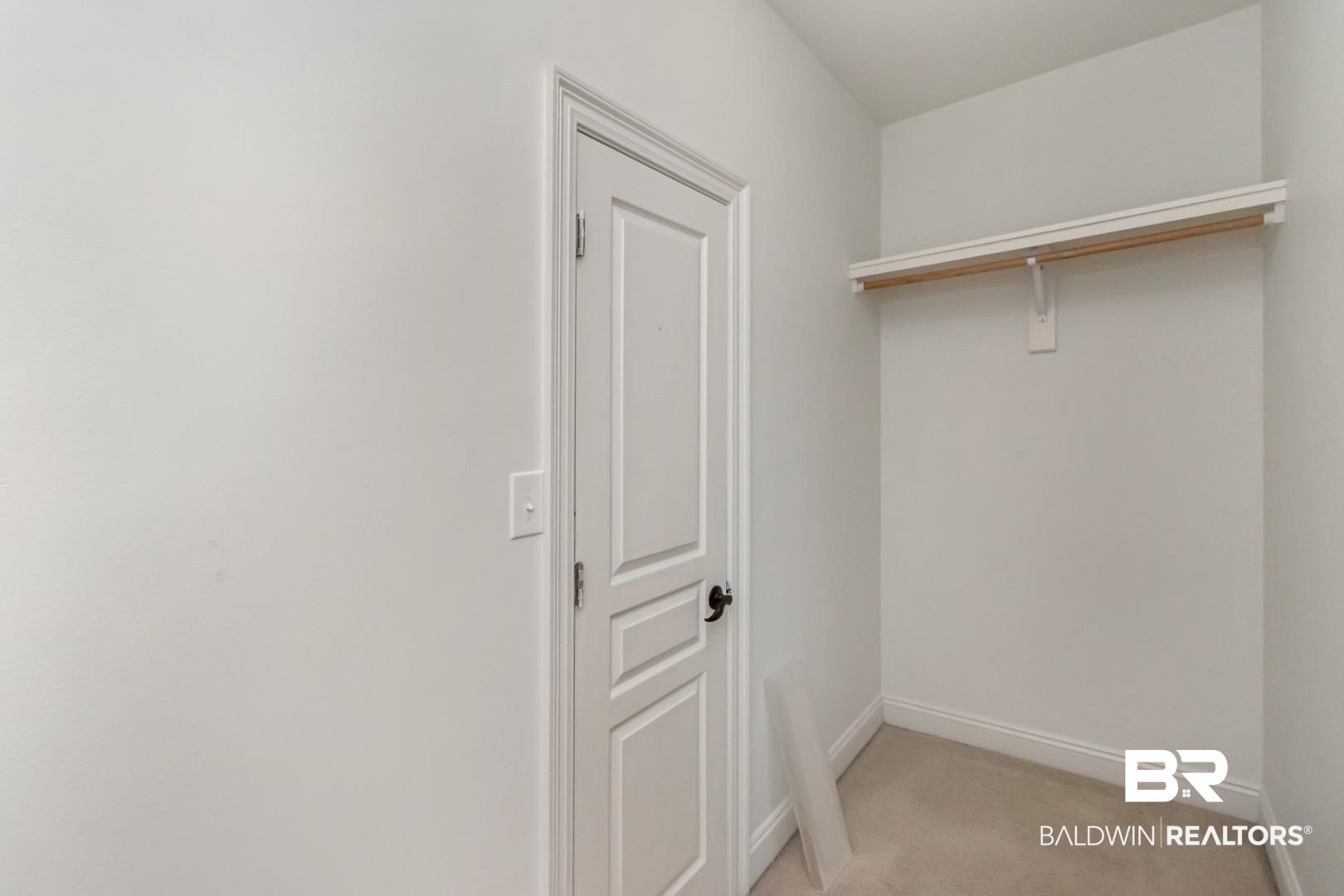 30585 Pine Court Daphne, AL 36527 - Photo 43 of 49 Laundry room with light colored carpet and baseboards