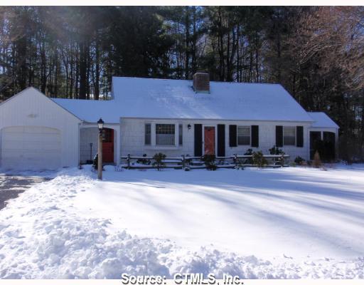 105 Sherwood Road Bristol, CT 06010 - Photo 1 of 1 a front view of a house with a yard and a garage