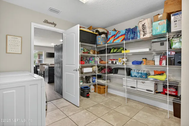 a view of storage and utility room