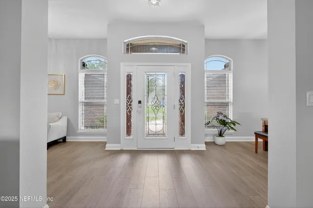 a view of livingroom with furniture and hardwood floor