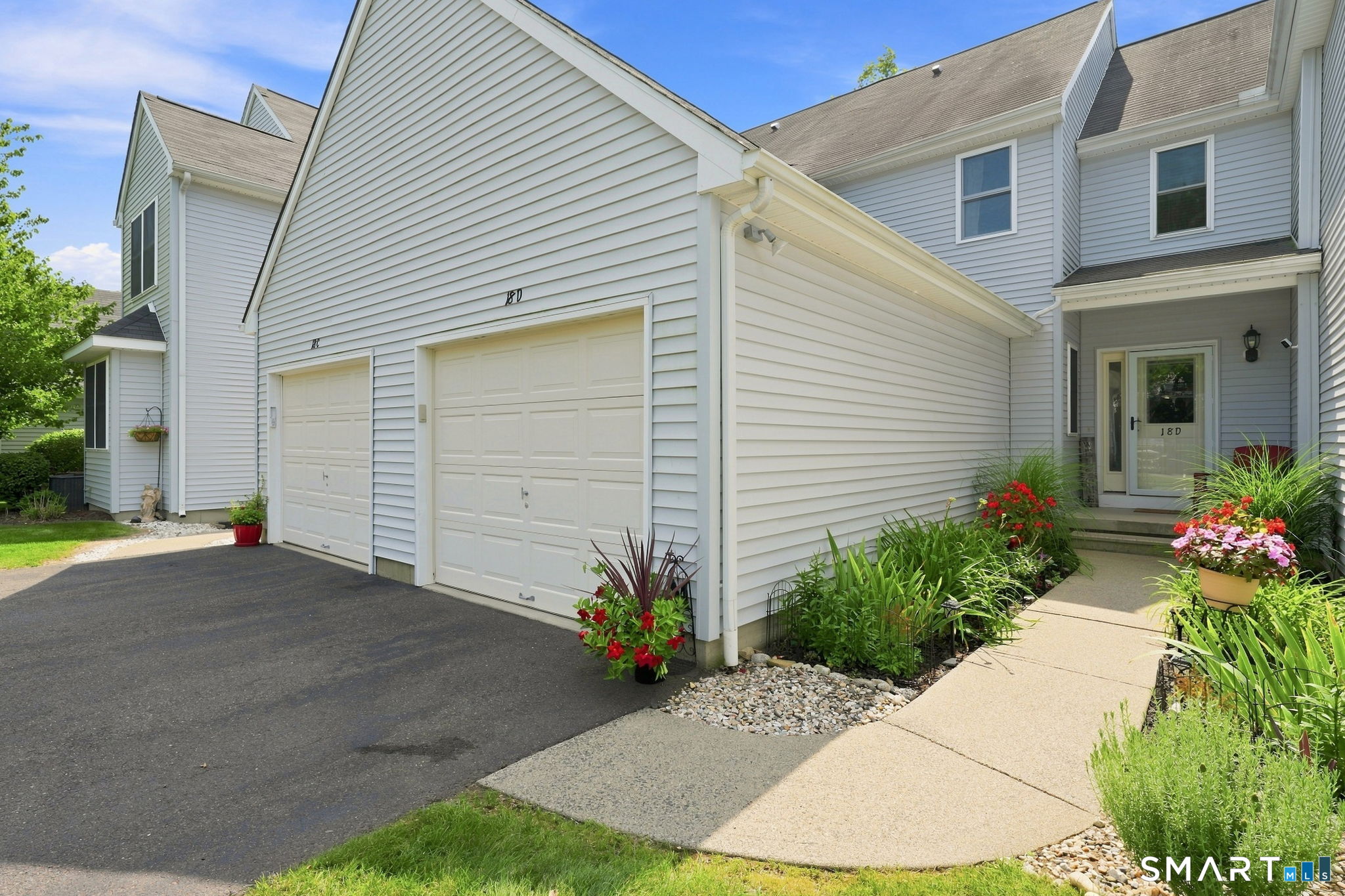 18 Folkstone Road, Unit D East Windsor, CT 06016 - Photo 2 of 36 Front entry with attached 1 car garage