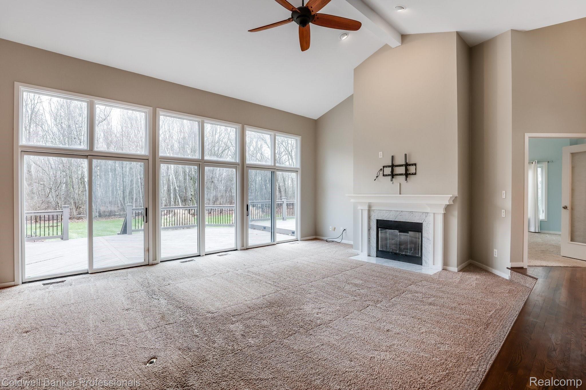 5365 Ridge Trail North Clarkston, MI 48348 - Photo 12 of 55 Living area with direct access to the deck