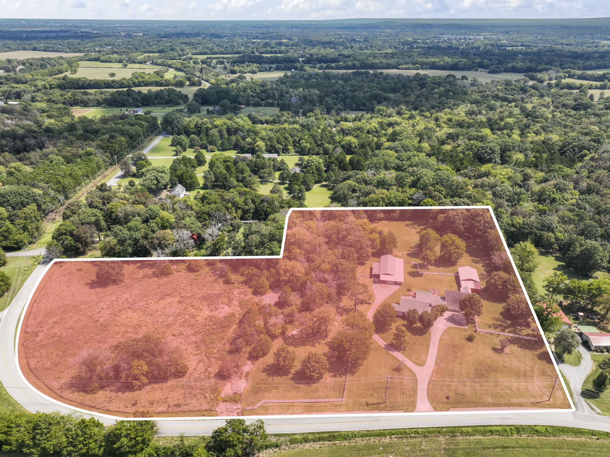 an aerial view of house with yard
