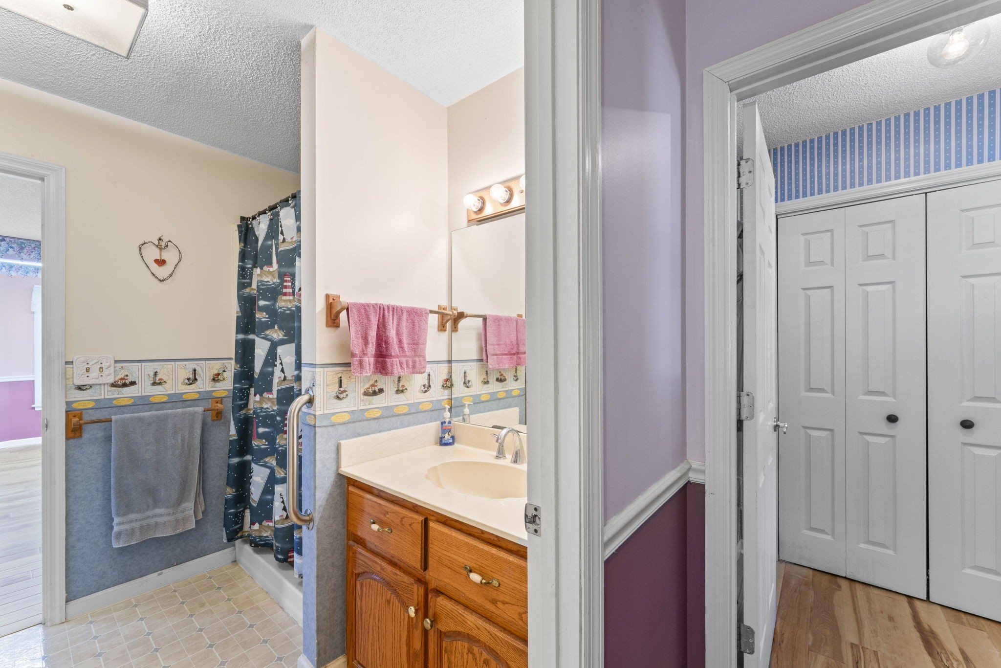 6737 Windrow Road Rockvale, TN 37153 - Photo 24 of 49 a bathroom with a sink vanity tub and shower