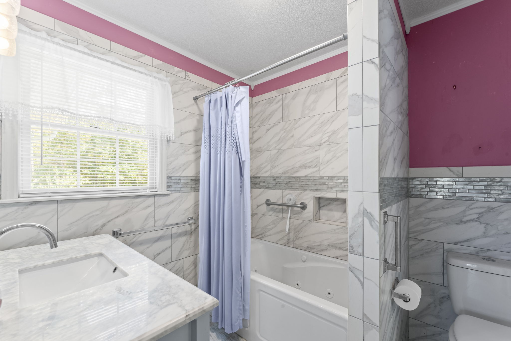 6737 Windrow Road Rockvale, TN 37153 - Photo 29 of 49 a bathroom with a sink and a bathtub