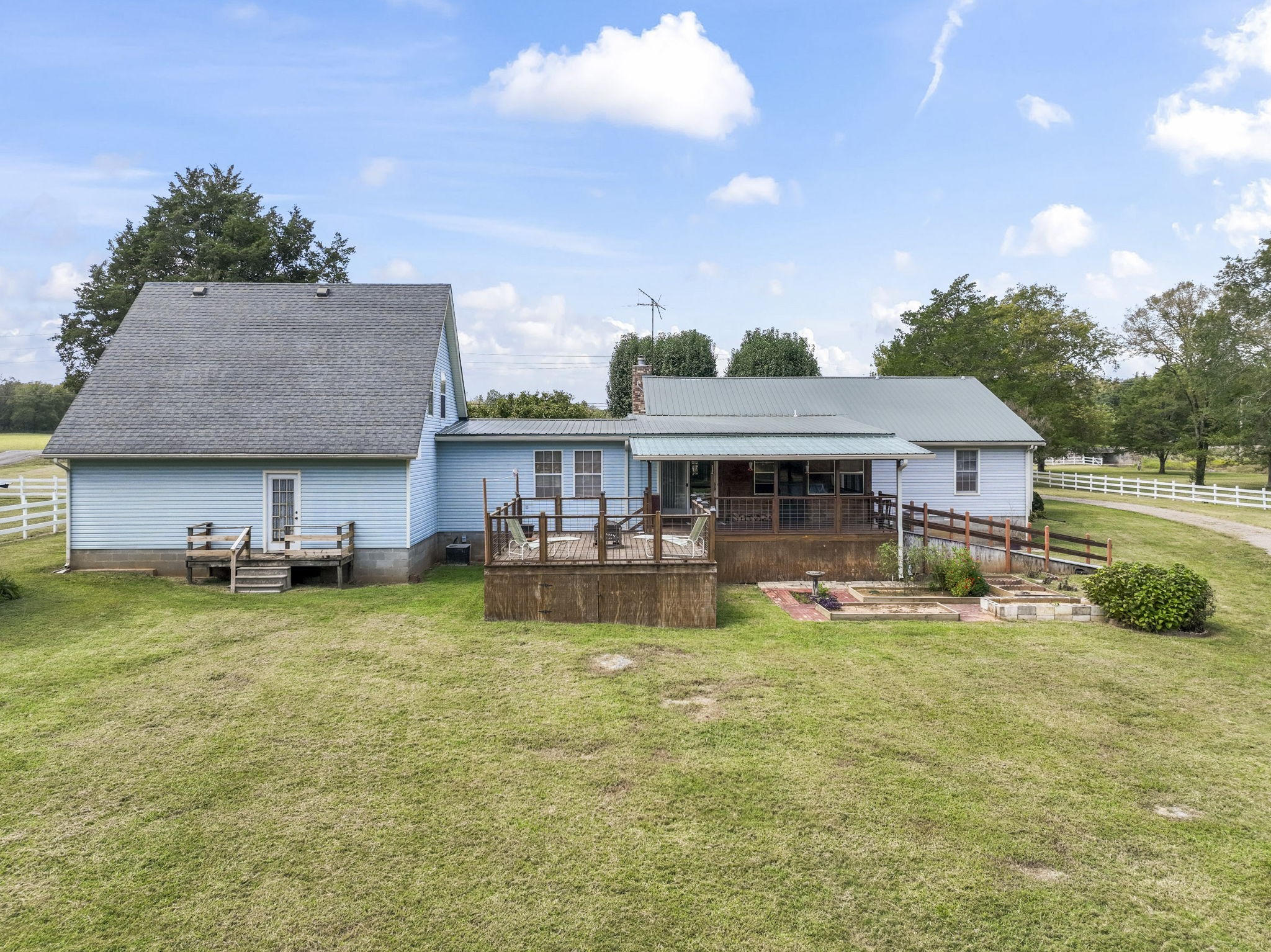 6737 Windrow Road Rockvale, TN 37153 - Photo 37 of 49 a view of a house with swimming pool and a yard