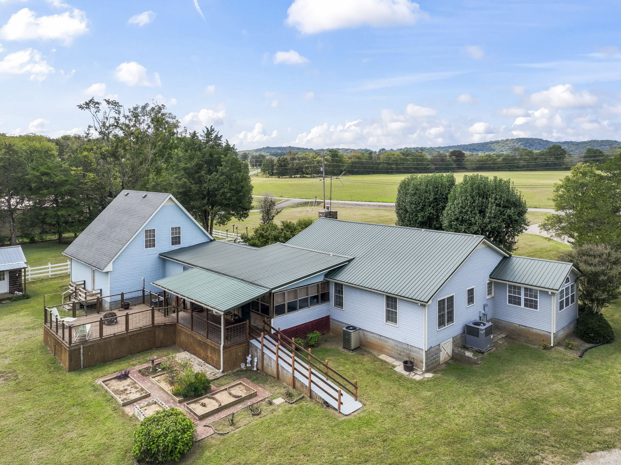 6737 Windrow Road Rockvale, TN 37153 - Photo 38 of 49 an aerial view of a house with swimming pool and big yard