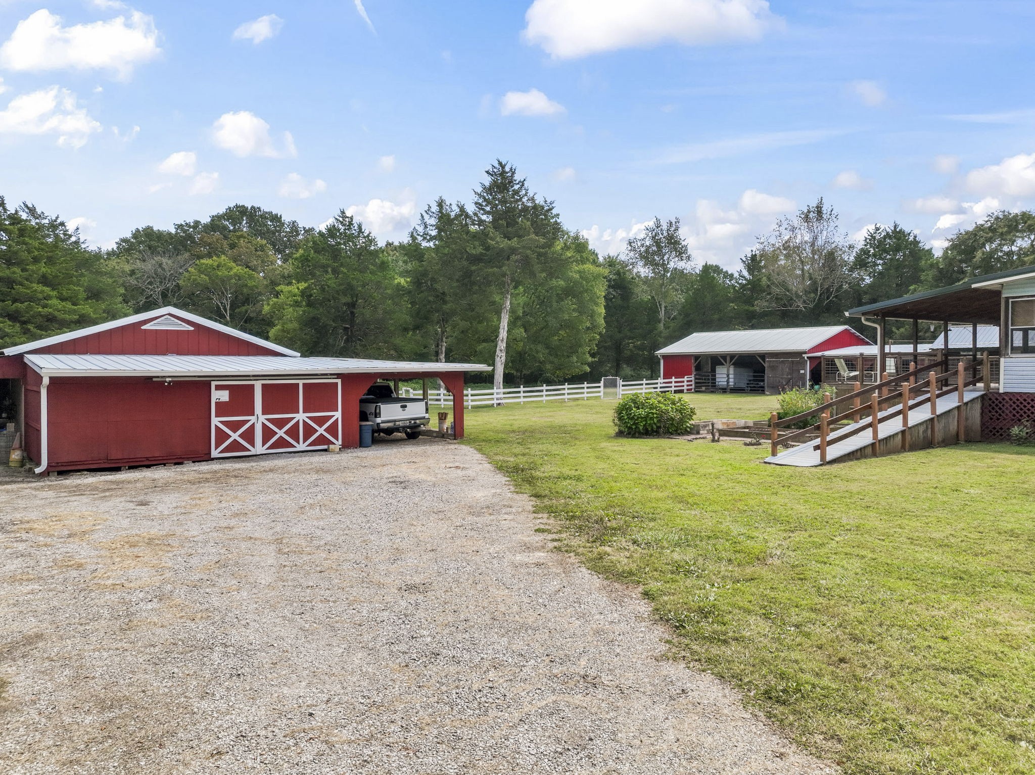 6737 Windrow Road Rockvale, TN 37153 - Photo 39 of 49 a front view of a house with garden