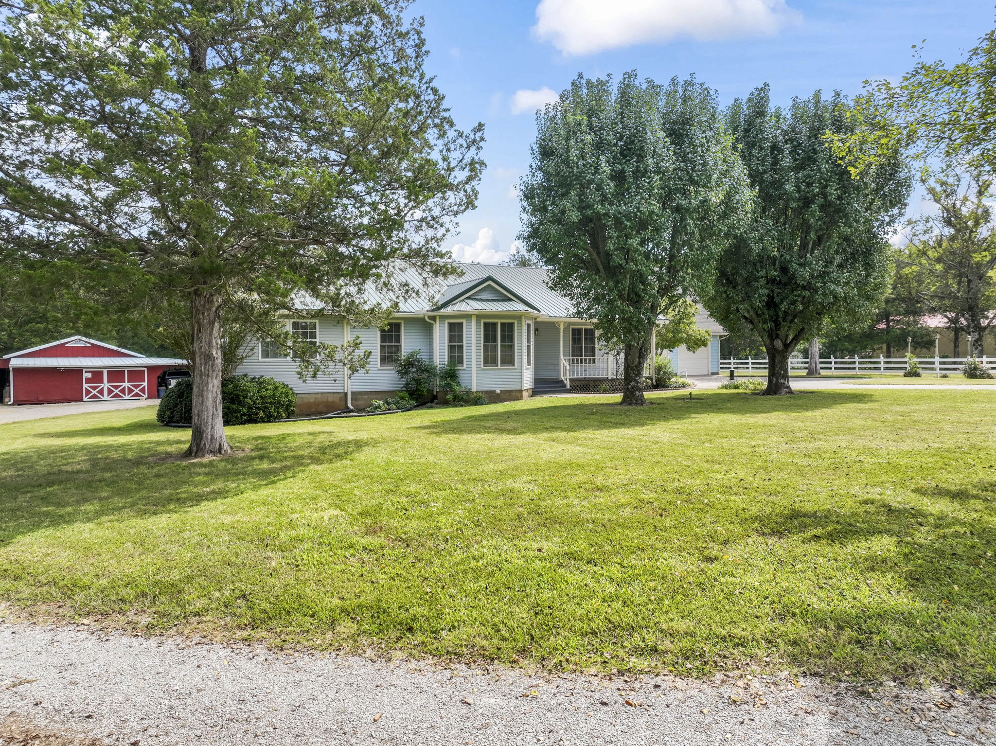 6737 Windrow Road Rockvale, TN 37153 - Photo 49 of 49 a front view of a house with a yard