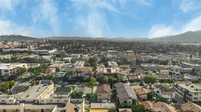 an aerial view of residential house and green space