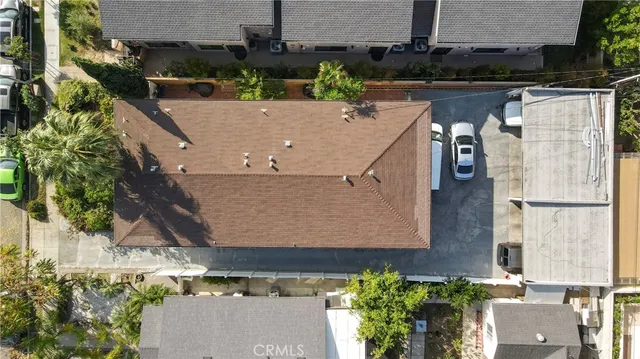 a stove top oven sitting inside of a kitchen