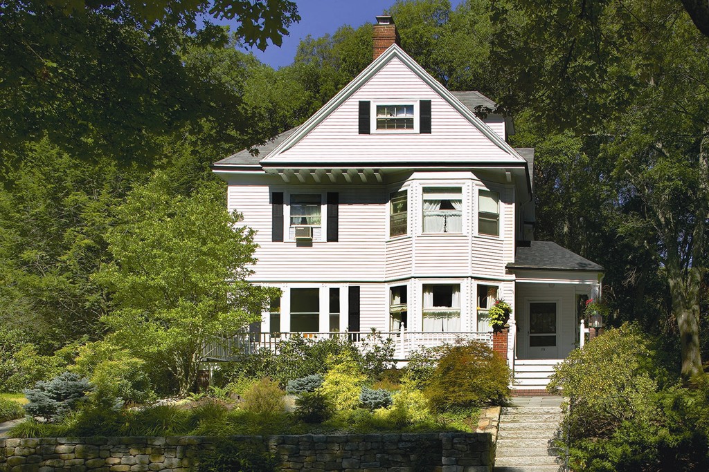 115 Windermere Road Newton, MA 02466 - Photo 1 of 8 a front view of a house with a yard and trees