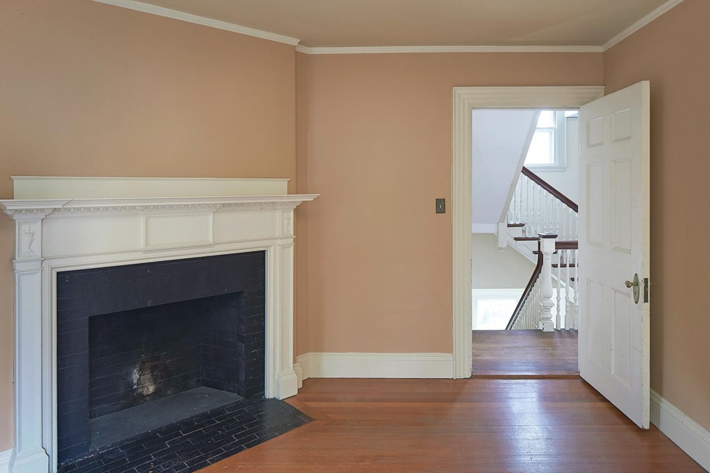 115 Windermere Road Newton, MA 02466 - Photo 5 of 8 a view of entryway and hall with wooden floor