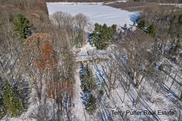 $395,000 | 2291 20 Mile Road Northwest, Kent City, MI 49330