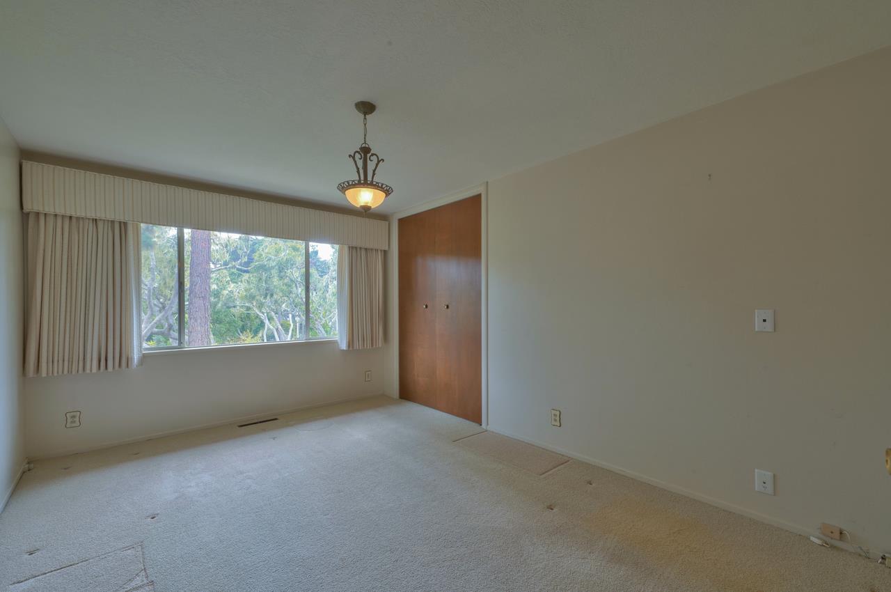 3245 Cabrillo Road Pebble Beach, CA 93953 - Photo 41 of 59 a view of an empty room with a window