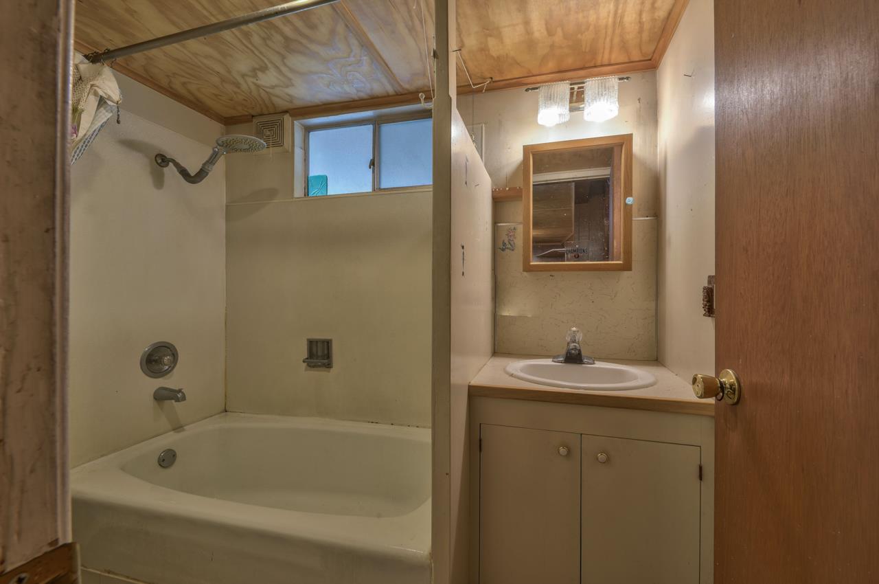 3245 Cabrillo Road Pebble Beach, CA 93953 - Photo 50 of 59 a bathroom with a sink and a bathtub