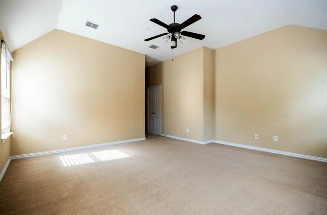 a view of a big room with carpet