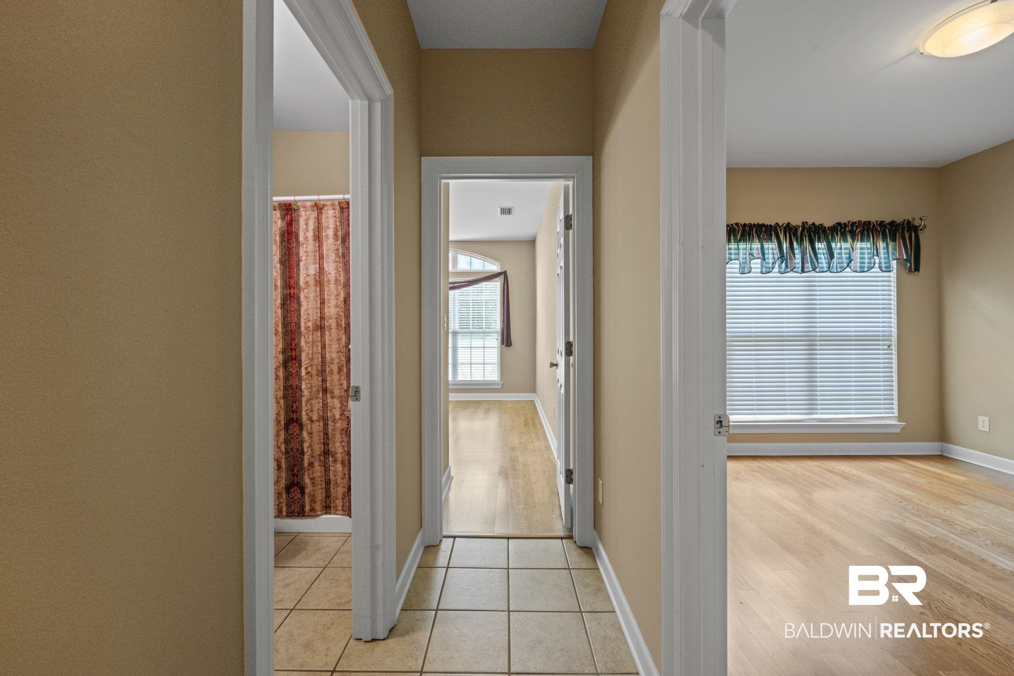 5618 Leytham Road Theodore, AL 36582 - Photo 36 of 60 Hallway with light tile patterned flooring