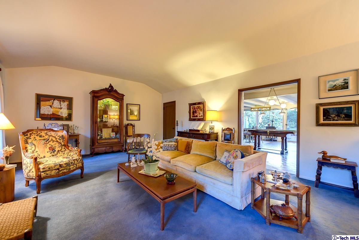 1271 Roanoke Road San Marino, CA 91108 - Photo 14 of 65 a living room with furniture and a window